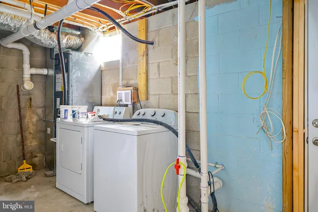 a view of house with backyard and garden