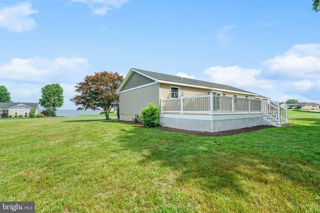 a view of a backyard of a house