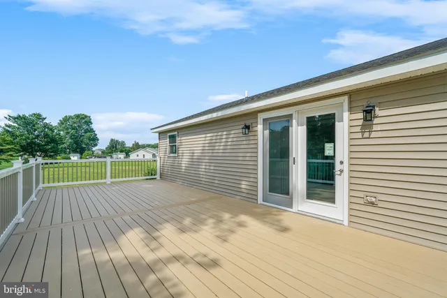 a view of a house with a big yard