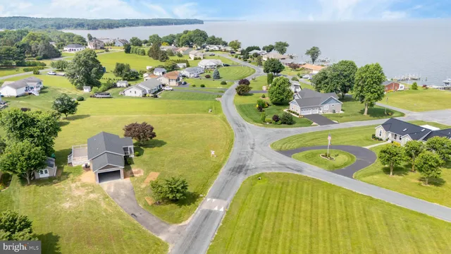 a view of swimming pool with outdoor seating