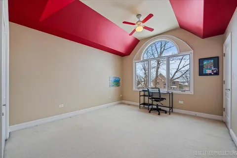 a view of hall way with furniture