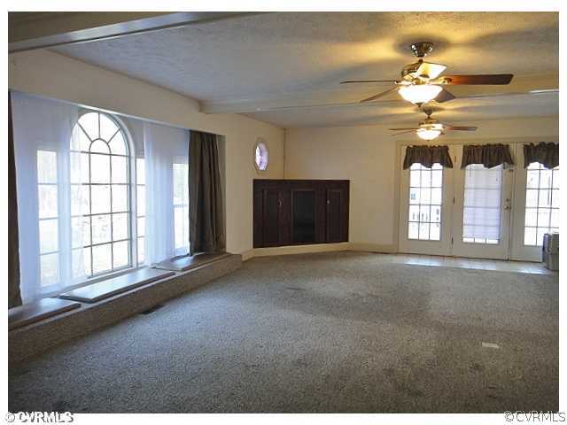 5407 Raleigh Road Henrico, VA 23231 - Photo 3 of 12 Den/Family/Great Room - Note the beamed ceiling an