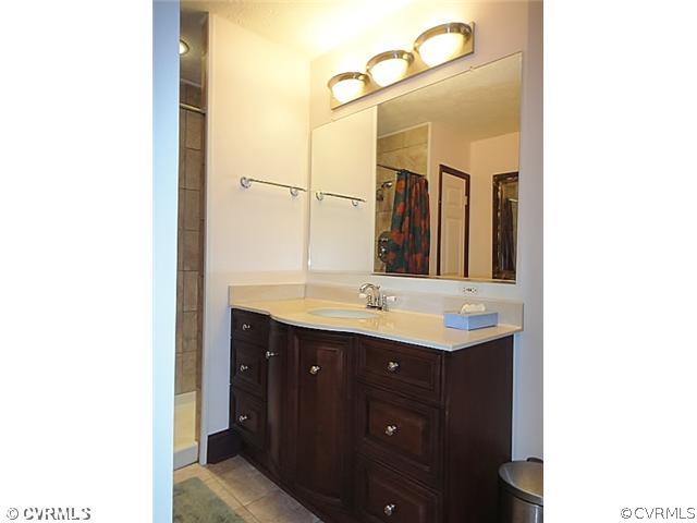 5407 Raleigh Road Henrico, VA 23231 - Photo 8 of 12 Master Bath/Spa - and Cherry Cabinetry..all surrou
