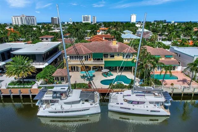 an aerial view of residential houses and city street