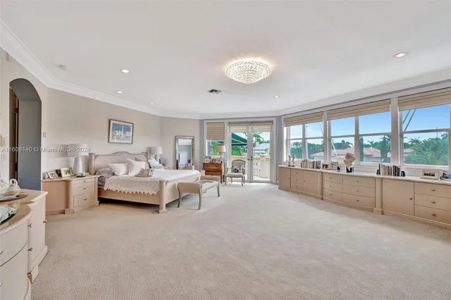 a view of an house with swimming pool yard and outdoor seating