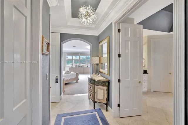 a view of a tables and chairs under an umbrella in the patio