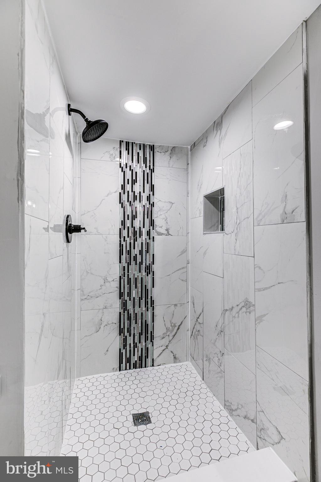 5011 Catalpha Road Baltimore, MD 21214 - Photo 40 of 42 a bathroom with a shower