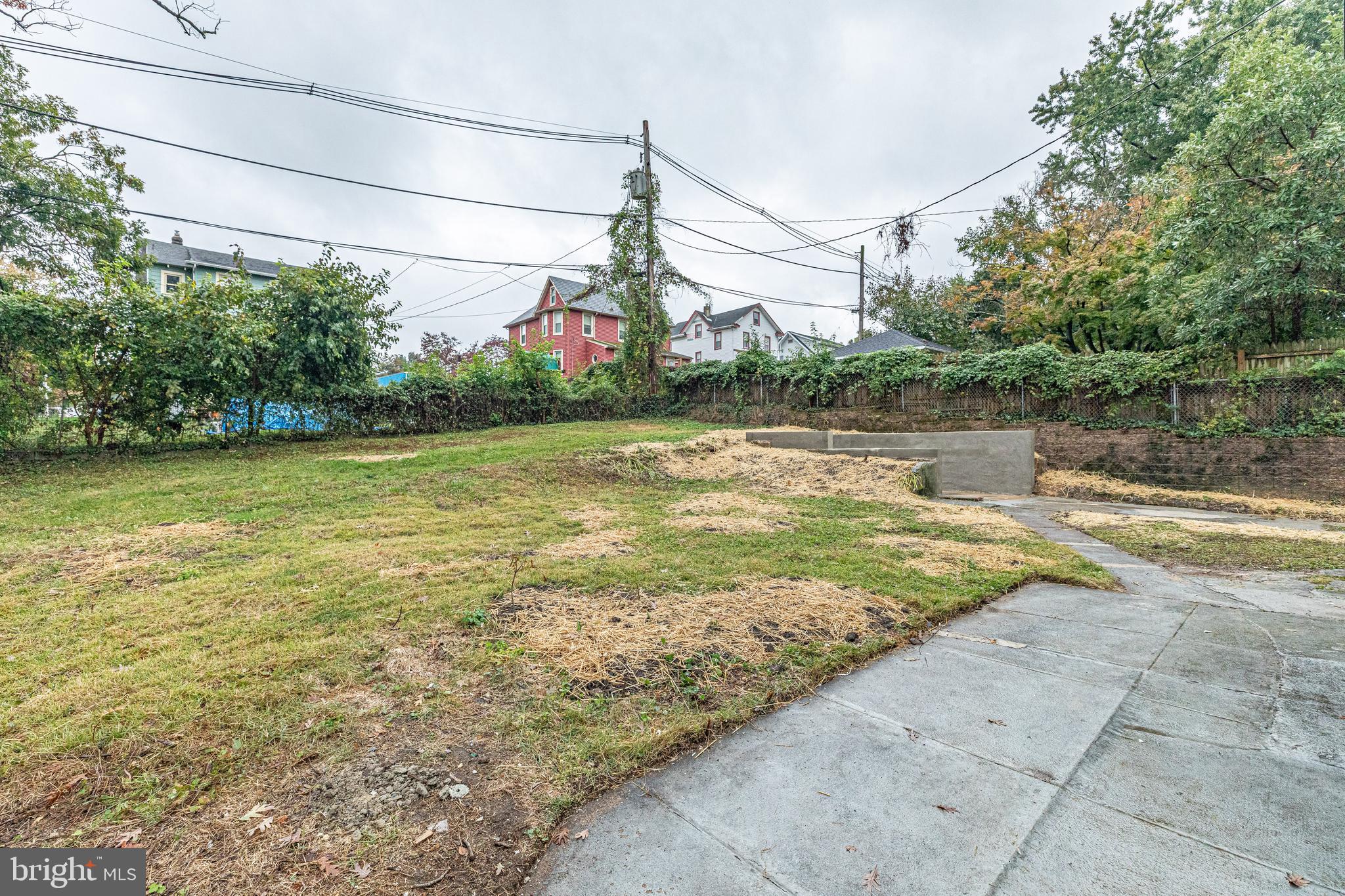 5011 Catalpha Road Baltimore, MD 21214 - Photo 42 of 42 a view of a lake with a wooden bridge