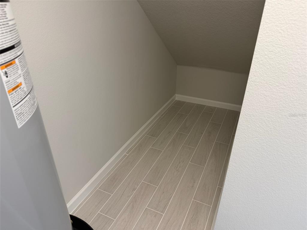 611 Pothos Street Apopka, FL 32703 - Photo 13 of 34 a view of a closet