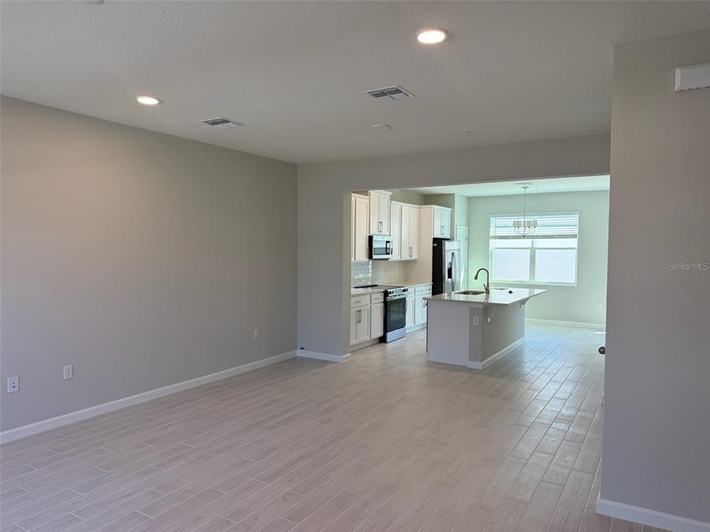 611 Pothos Street Apopka, FL 32703 - Photo 2 of 34 a view of kitchen and windows