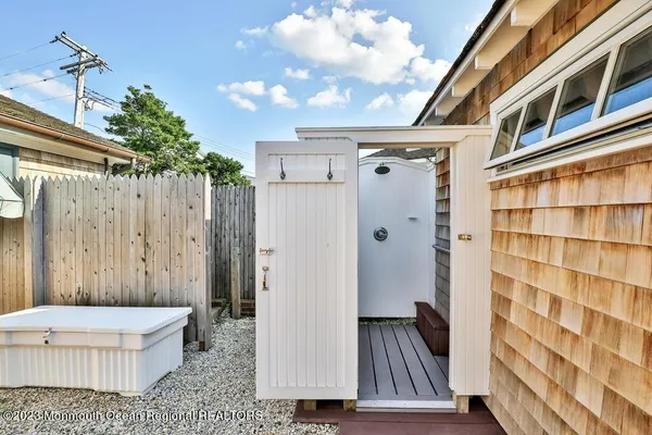 a view of swimming pool with outdoor seating and yard in the back