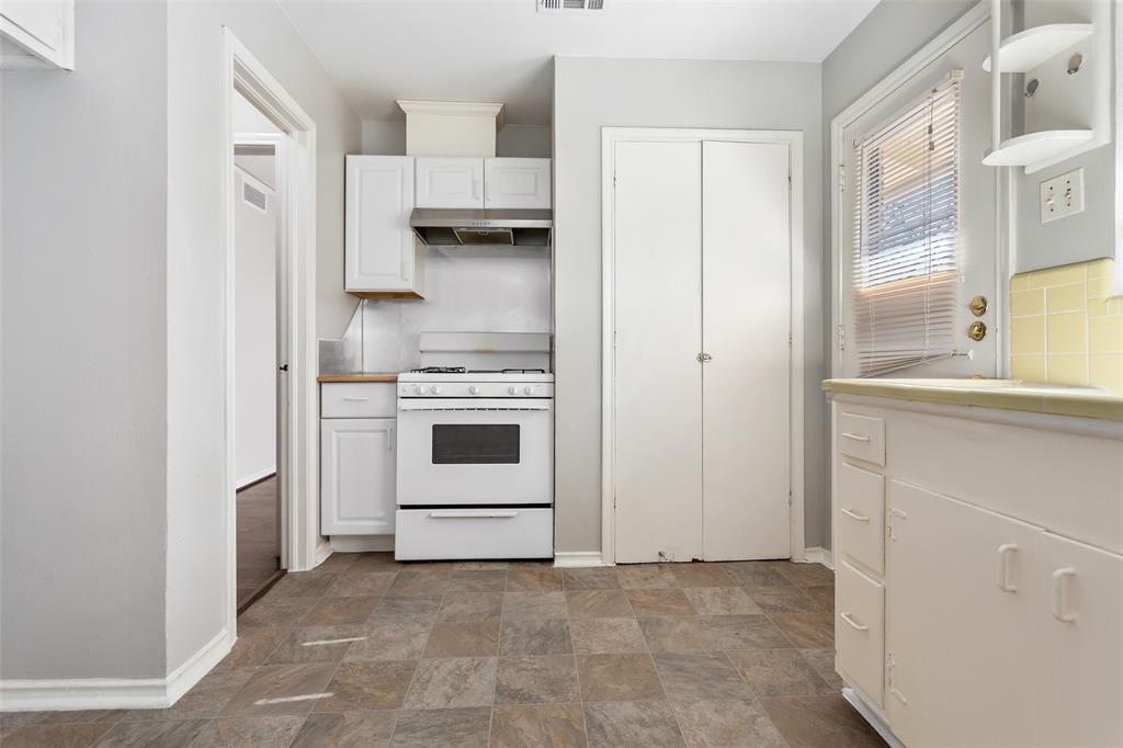6520 St Moritz Avenue Dallas, TX 75214 - Photo 13 of 31 a view of a kitchen with a stove top oven