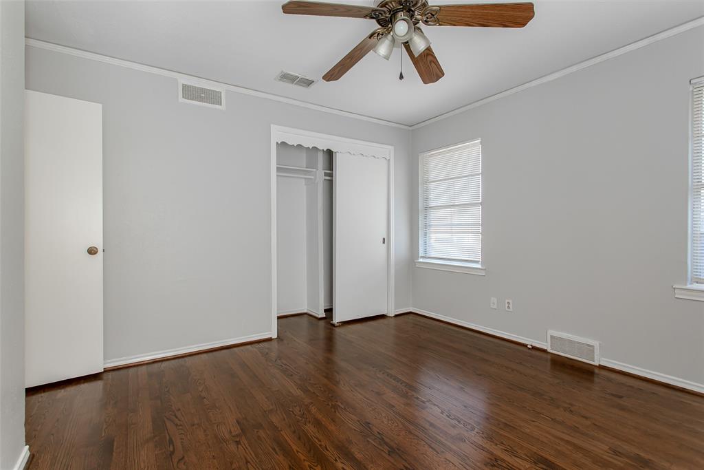 6520 St Moritz Avenue Dallas, TX 75214 - Photo 19 of 31 a view of room with hardwood floor and window