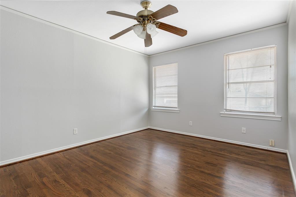 6520 St Moritz Avenue Dallas, TX 75214 - Photo 22 of 31 wooden floor in an empty room with a window