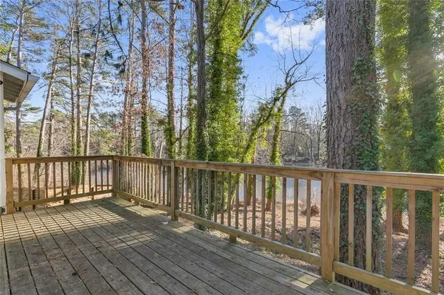 a view of balcony with wooden floor