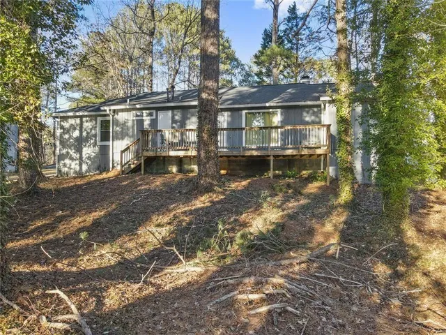 a view of house with yard