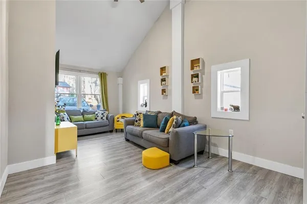 a living room with furniture and a window
