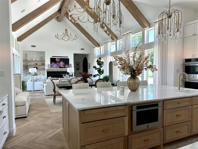 a view of living room and kitchen with furniture