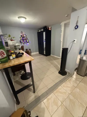 a kitchen with a sink appliances and cabinets