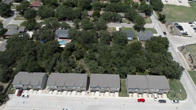 an aerial view of residential house with outdoor space