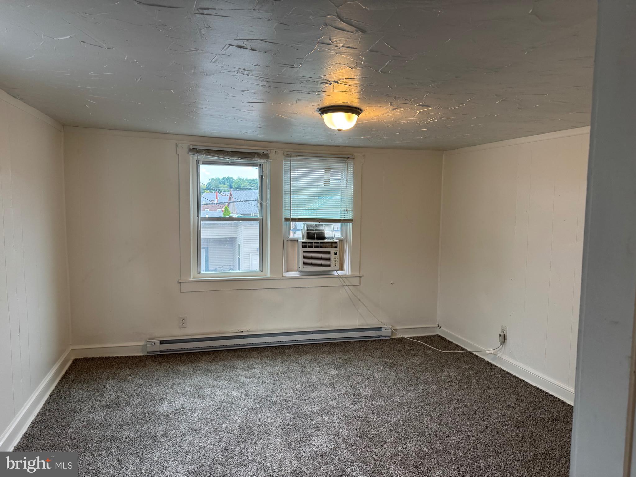 an empty room with a window