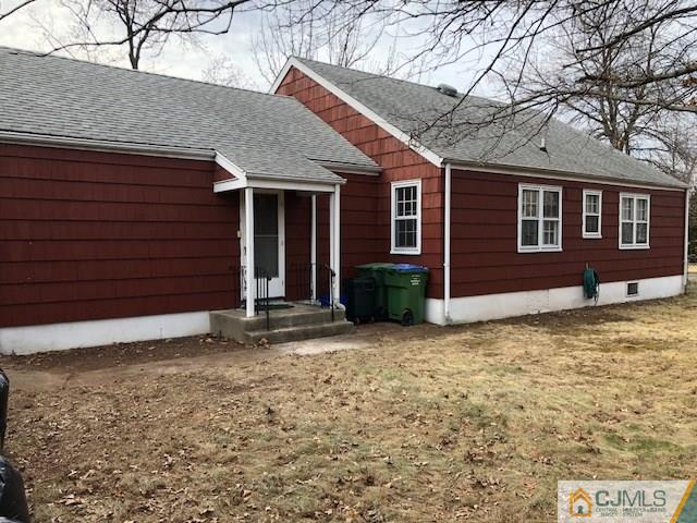 17 Clausen Road Edison, NJ 08817 - Photo 16 of 18 a front view of a house with garden