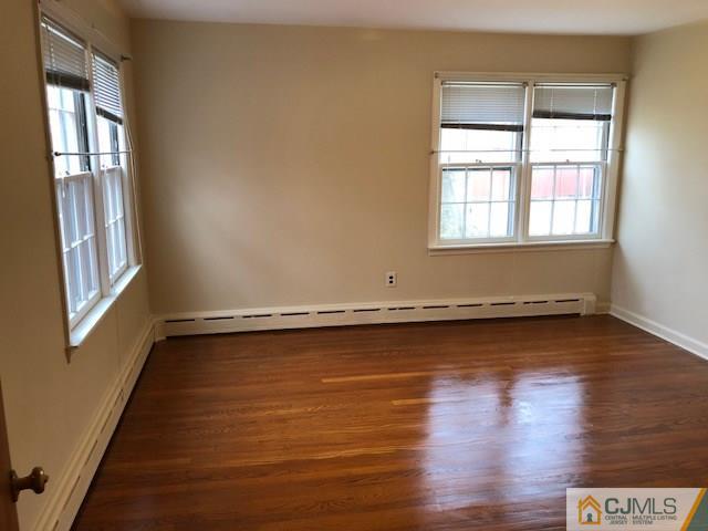 17 Clausen Road Edison, NJ 08817 - Photo 10 of 18 a view of a room with wooden floor and window