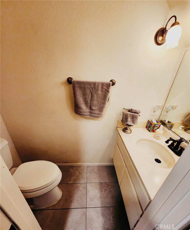 6443 Stoney View Lane, Unit 4 Simi Valley, CA 93063 - Photo 8 of 13 a bathroom with a sink and a toilet