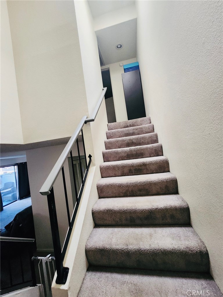 6443 Stoney View Lane, Unit 4 Simi Valley, CA 93063 - Photo 9 of 13 a view of staircase with wooden floor