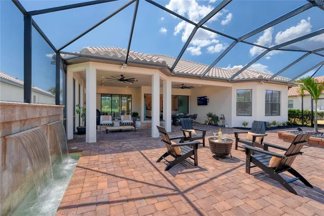 a outdoor space with lots of tables and chairs