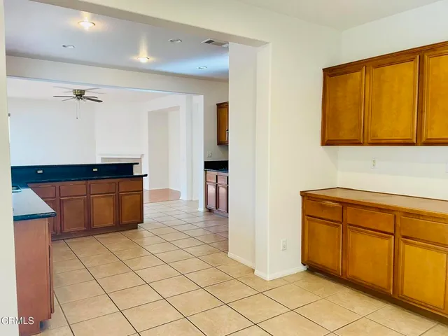 a view of a kitchen with cabinets