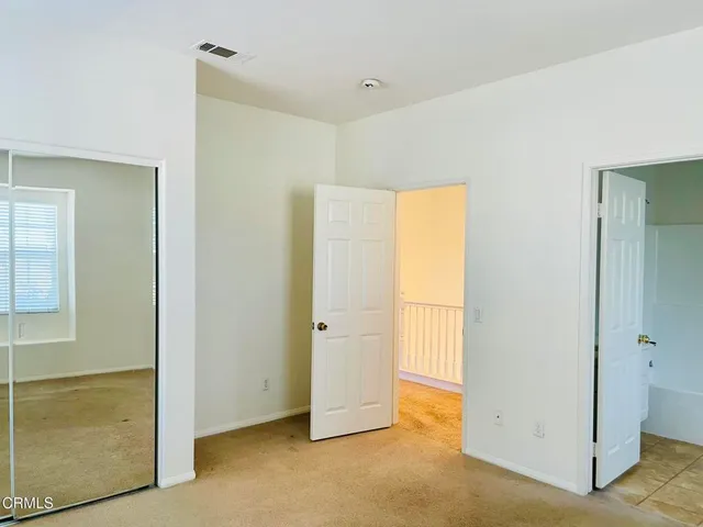 a bathroom with a bathtub and toilet