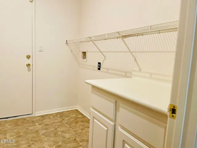 a bathroom with a sink and vanity