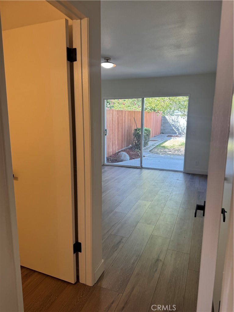 20157 Mckay Drive Walnut, CA 91789 - Photo 4 of 15 an empty room with wooden floor and windows