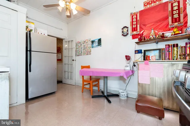 a kitchen with stainless steel appliances granite countertop a stove and a refrigerator