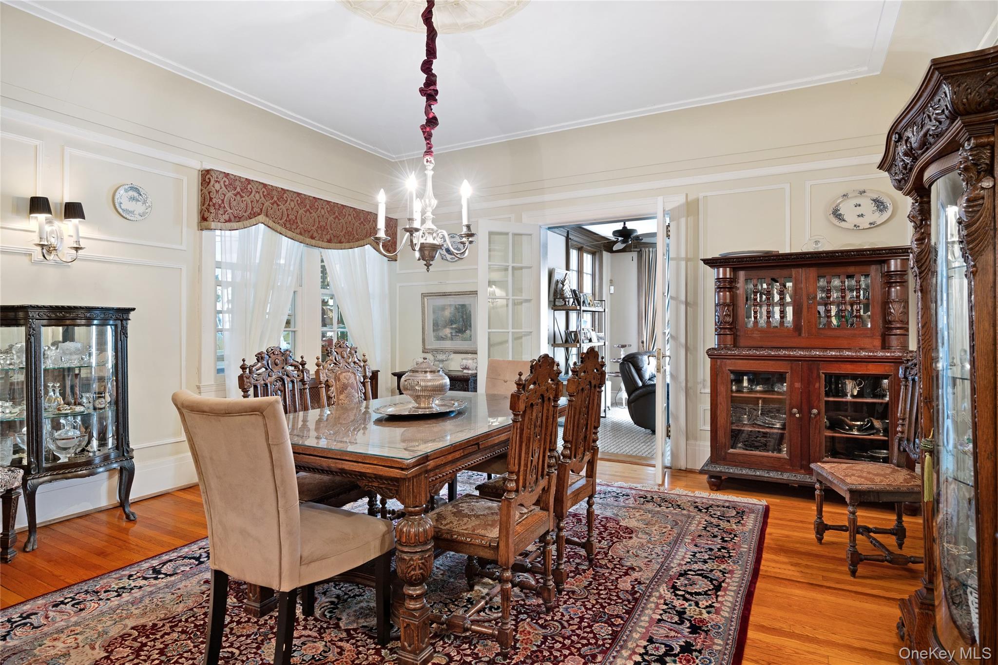 1-27 Beverly Road Queens, NY 11363 - Photo 36 of 46 a view of a dining room with furniture window and wooden floor