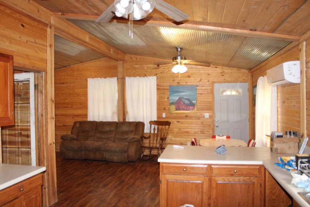 416 New Hope Road Marshall, AR 72650 - Photo 19 of 60 cabin kitchen-living area