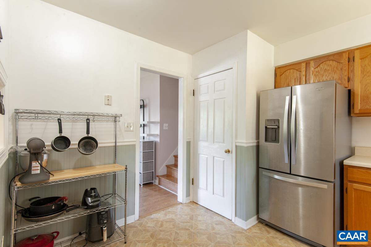 368 Minor Ridge Road Charlottesville, VA 22901 - Photo 11 of 29 a kitchen with stainless steel appliances granite countertop a refrigerator and a stove