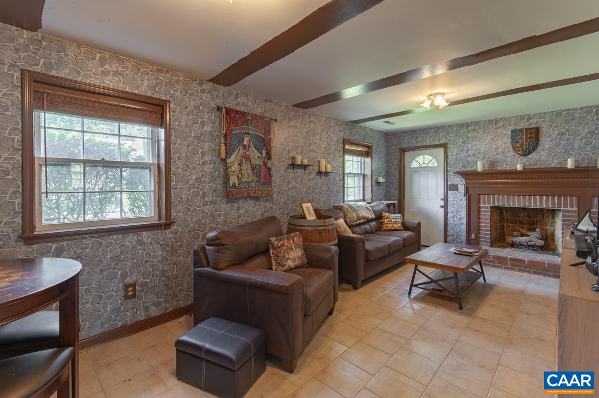 368 Minor Ridge Road Charlottesville, VA 22901 - Photo 19 of 29 a living room with furniture and a fireplace