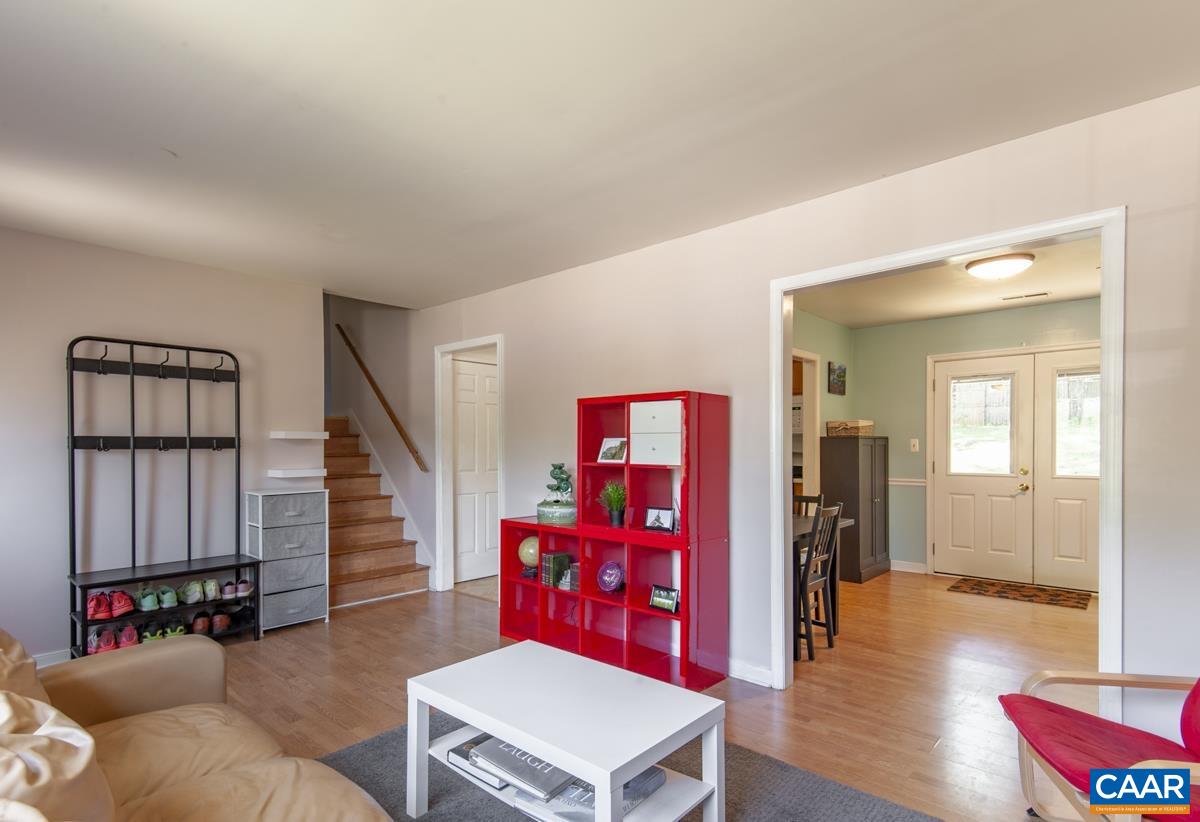 368 Minor Ridge Road Charlottesville, VA 22901 - Photo 6 of 29 a living room with furniture and wooden floor