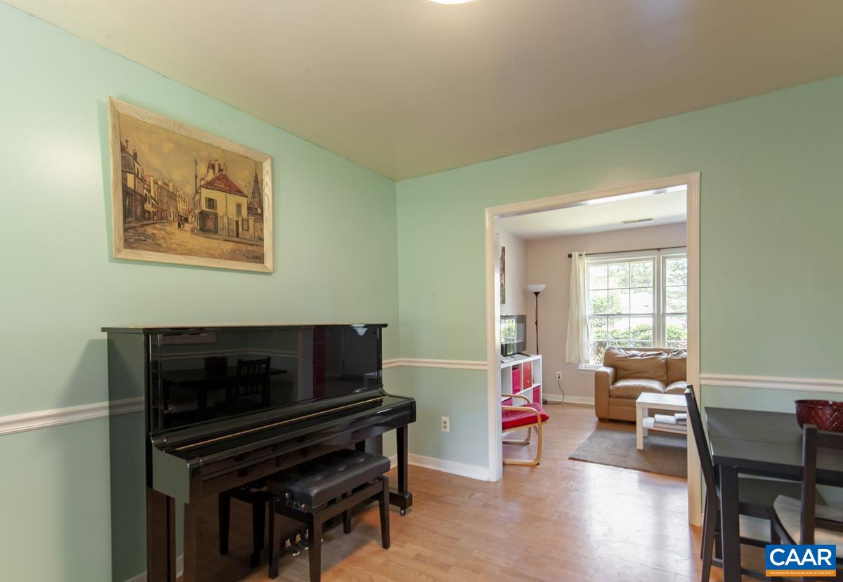 368 Minor Ridge Road Charlottesville, VA 22901 - Photo 7 of 29 a living room with furniture and a flat screen tv