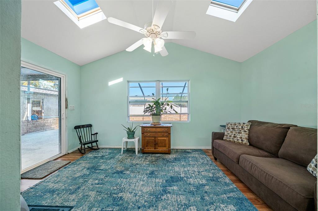 9061 Byron Street Spring Hill, FL 34606 - Photo 13 of 43 a living room with furniture