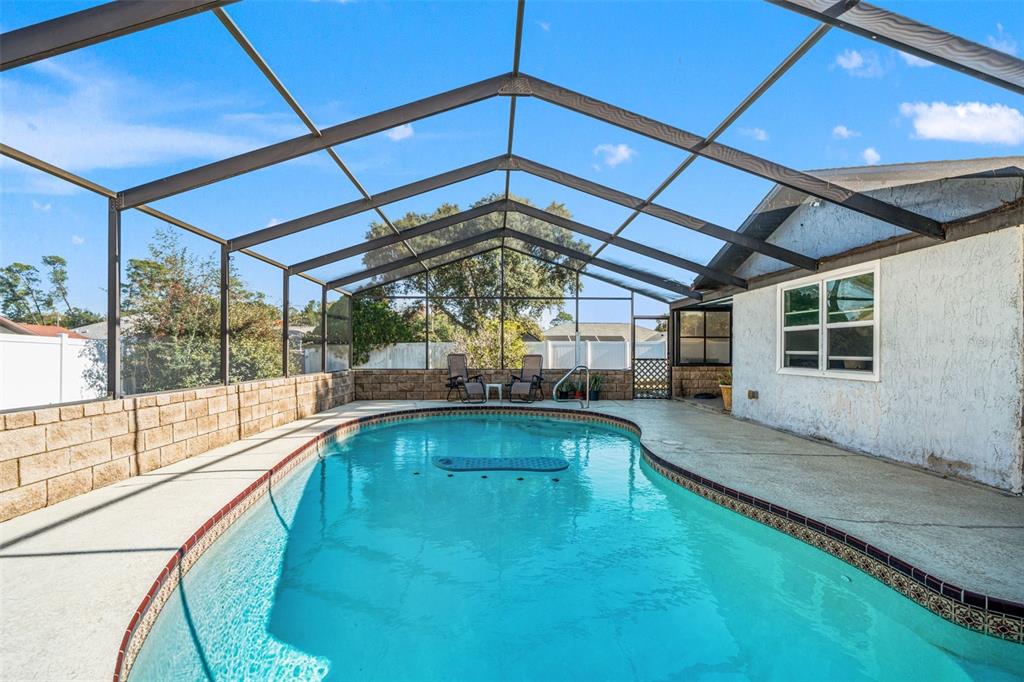 9061 Byron Street Spring Hill, FL 34606 - Photo 29 of 43 a view of a indoor swimming pool