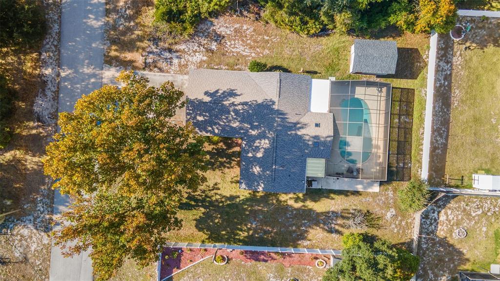 9061 Byron Street Spring Hill, FL 34606 - Photo 39 of 43 an aerial view of residential houses with outdoor space