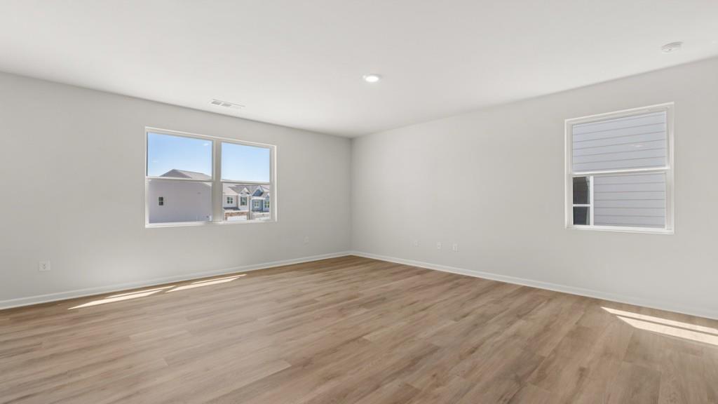 33 Rolling Mdw Trace Jasper, GA 30143 - Photo 14 of 38 a view of an empty room with wooden floor and a window