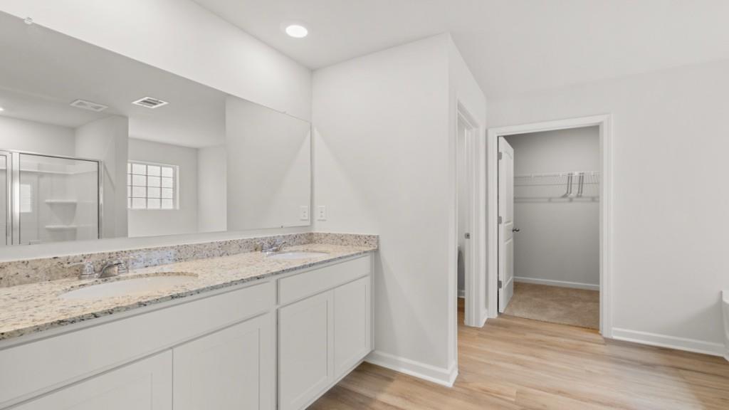 33 Rolling Mdw Trace Jasper, GA 30143 - Photo 21 of 38 a bathroom with a granite countertop sink and a mirror