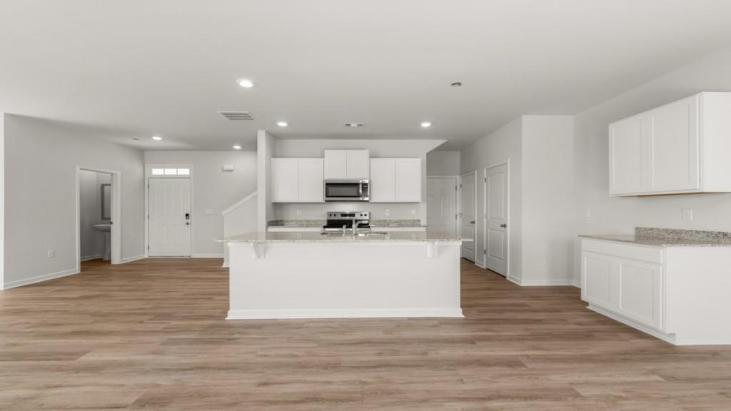 33 Rolling Mdw Trace Jasper, GA 30143 - Photo 5 of 38 a view of kitchen with wooden floor
