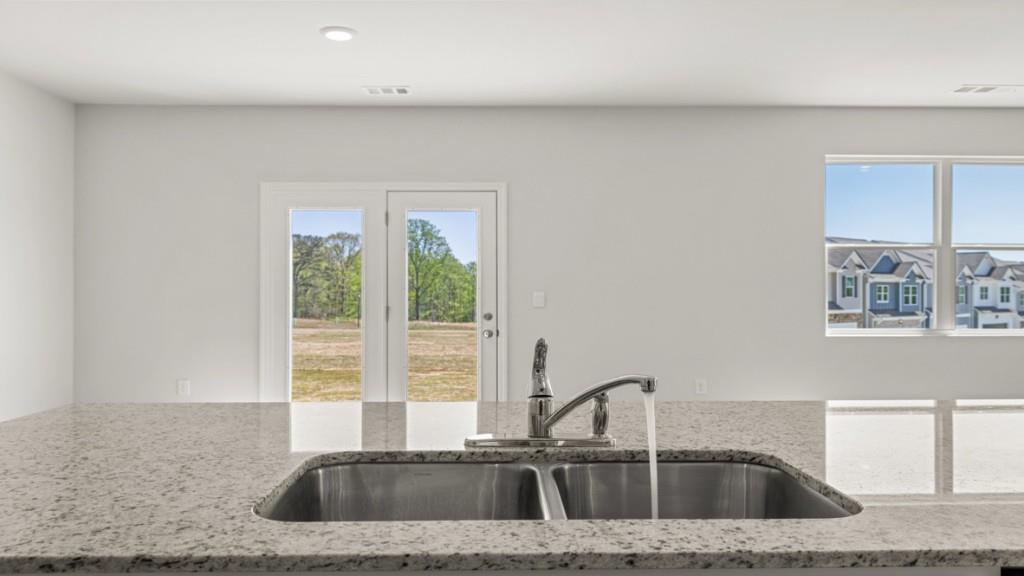 33 Rolling Mdw Trace Jasper, GA 30143 - Photo 8 of 38 a kitchen with a sink and a window