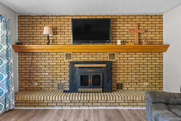 a view of a fireplace with a sink