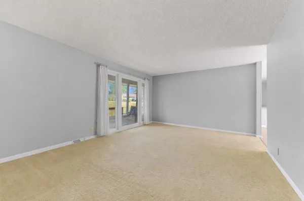 a view of an empty room with window